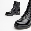 Nero Giardini bottines en cuir vernis noir style rangers